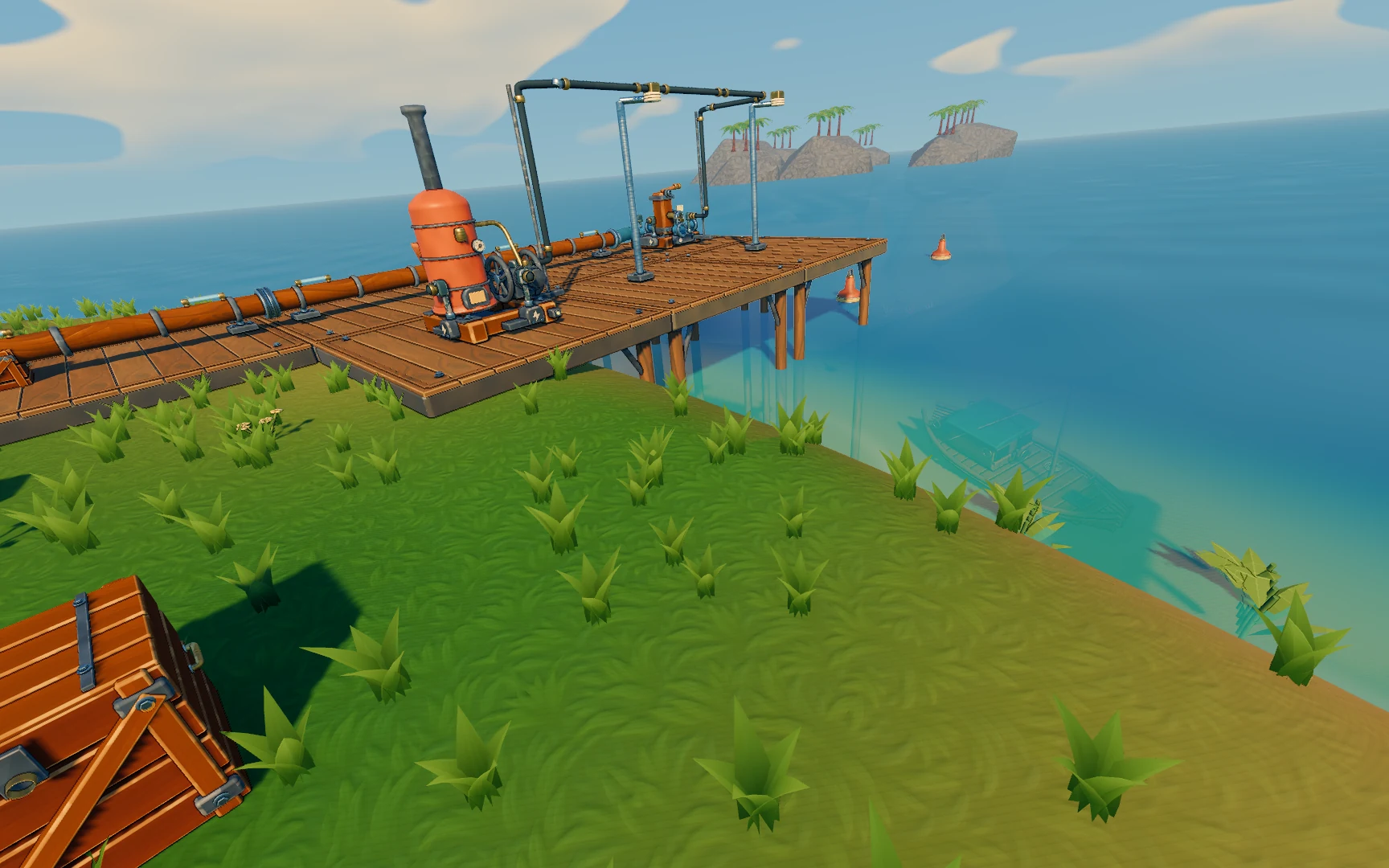 A handcrafted pump and orange pipes on a wooden jetty by the sea